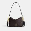 Borsa a tracolla Carey in Signature Canvas