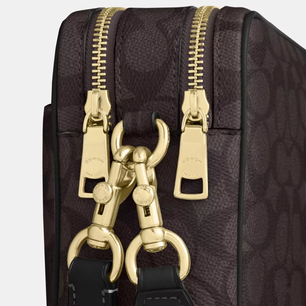 Borsa a tracolla Carey in Signature Canvas