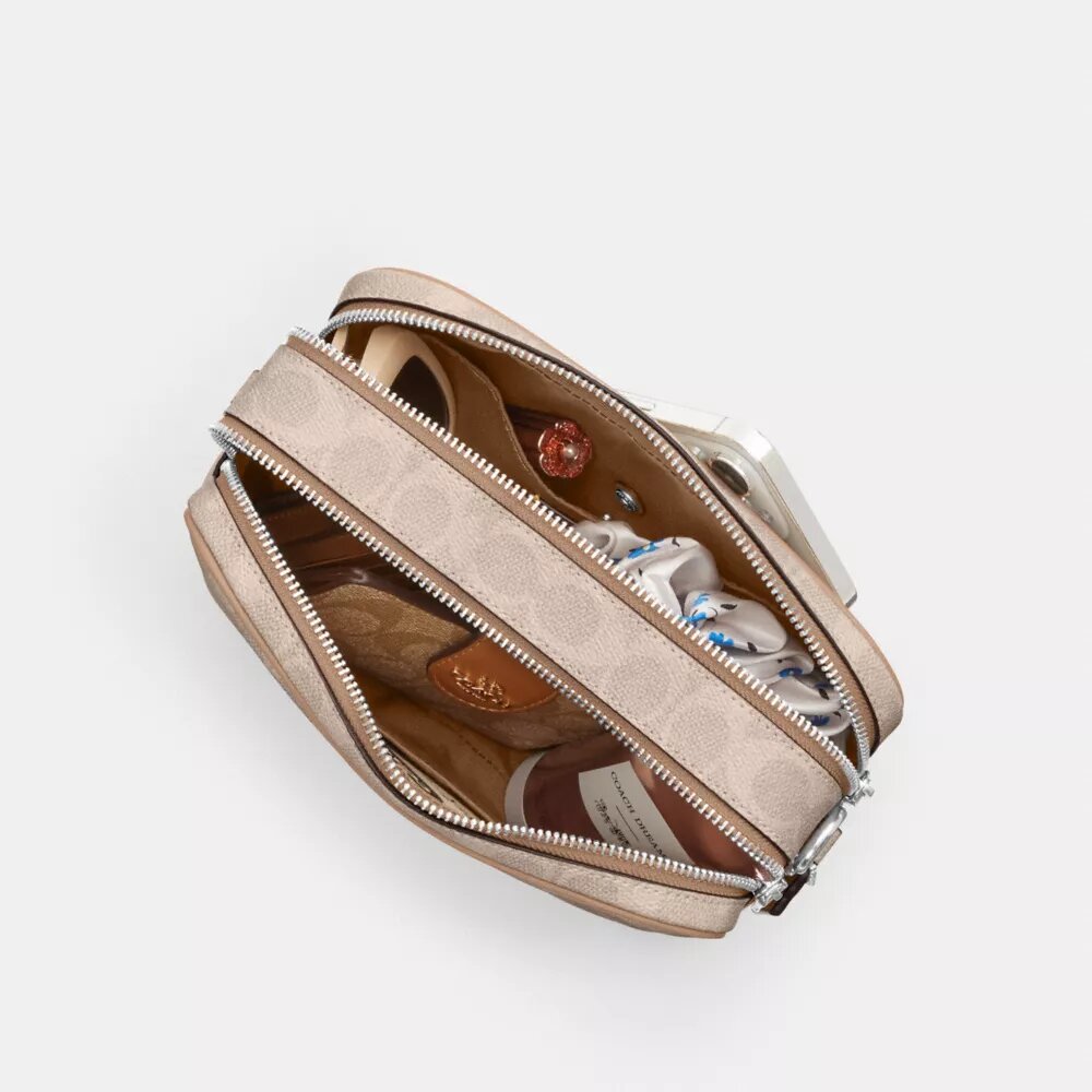 Borsa a tracolla Carey in Signature Canvas