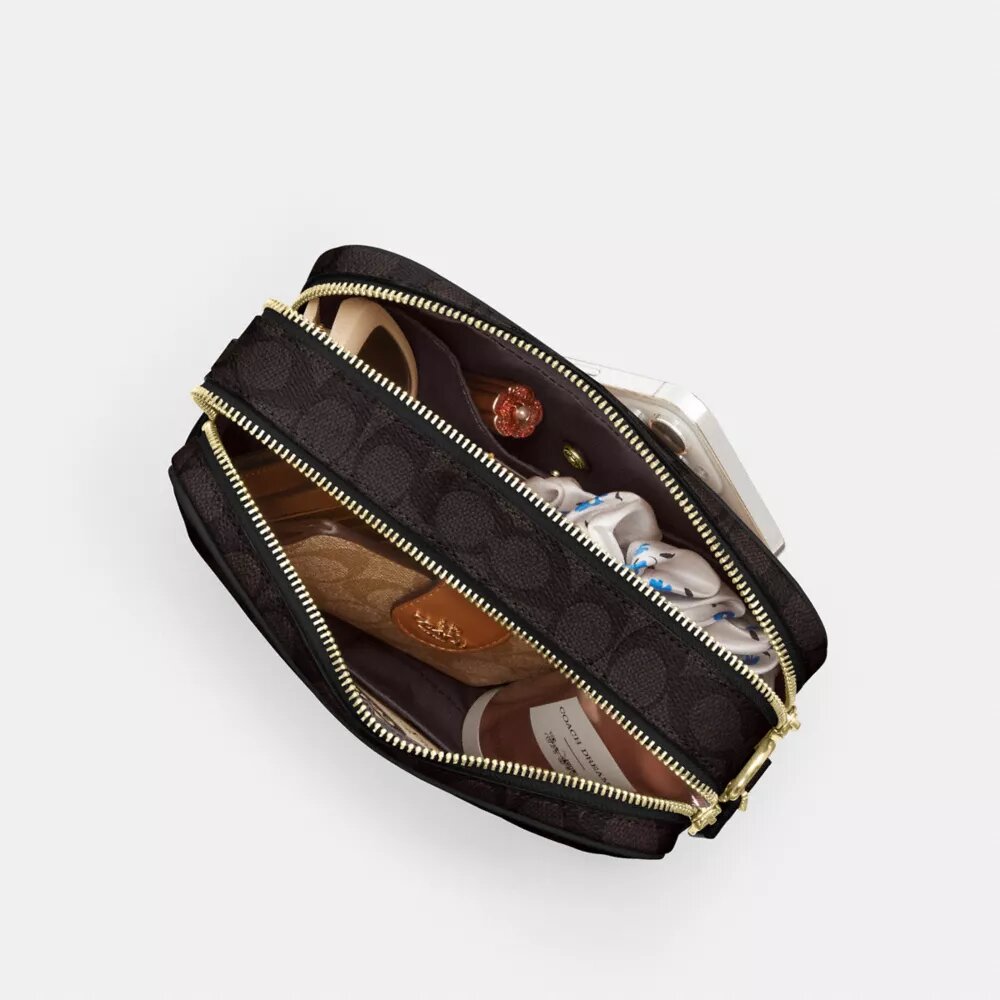 Borsa a tracolla Carey in Signature Canvas