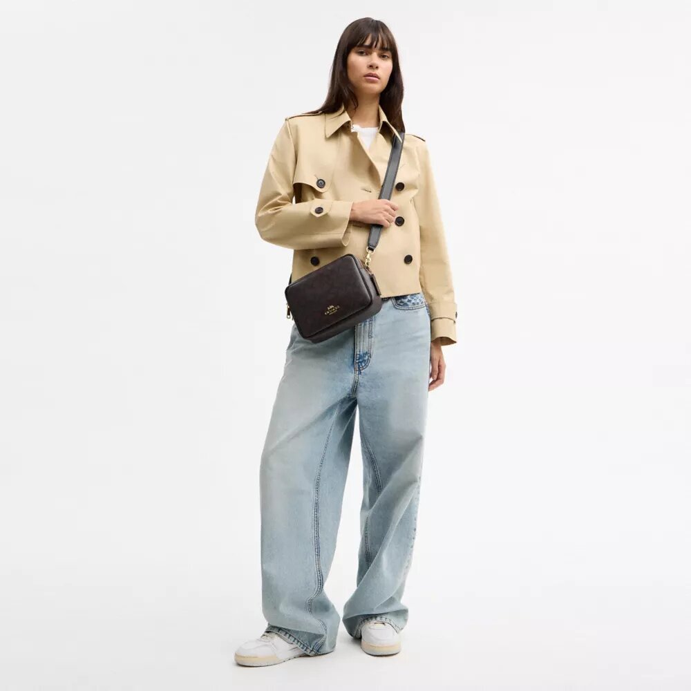 Borsa a tracolla Carey in Signature Canvas