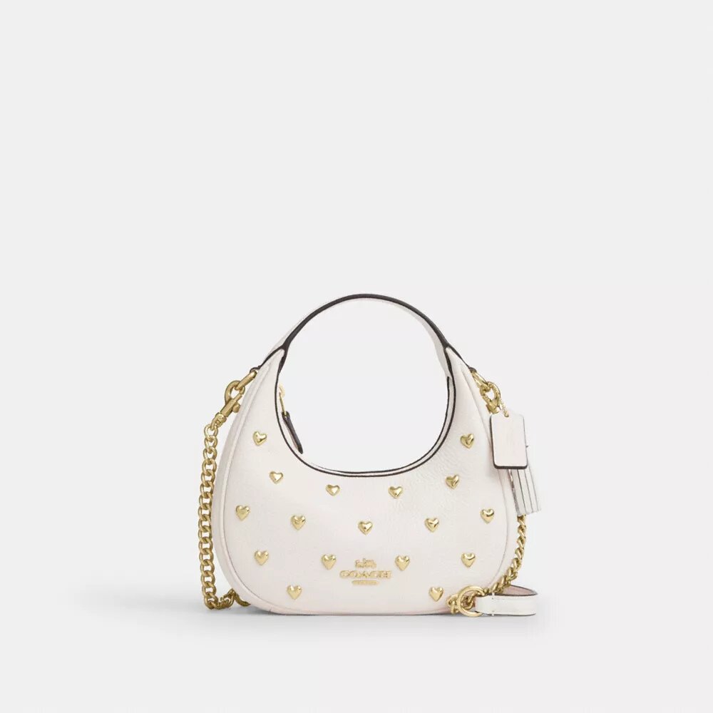 Borsa a tracolla Carmen Mini con rivetti a forma di cuore