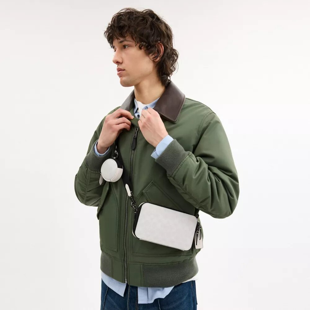 Borsa a tracolla Charter Slim in Signature Canvas
