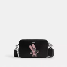 Borsa a tracolla Clinton con grafica floscia