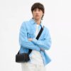 Borsa a tracolla Colton 19 in Signature Canvas