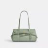 Borsa a tracolla con patta Bridget e fiocchi