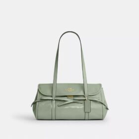 Borsa a tracolla con patta Bridget e fiocchi