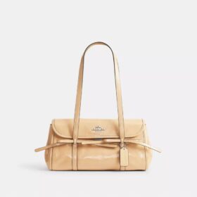 Borsa a tracolla con patta Bridget e fiocchi