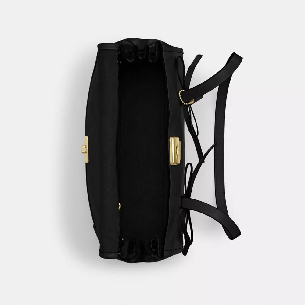 Borsa a tracolla con patta Bridget e fiocchi