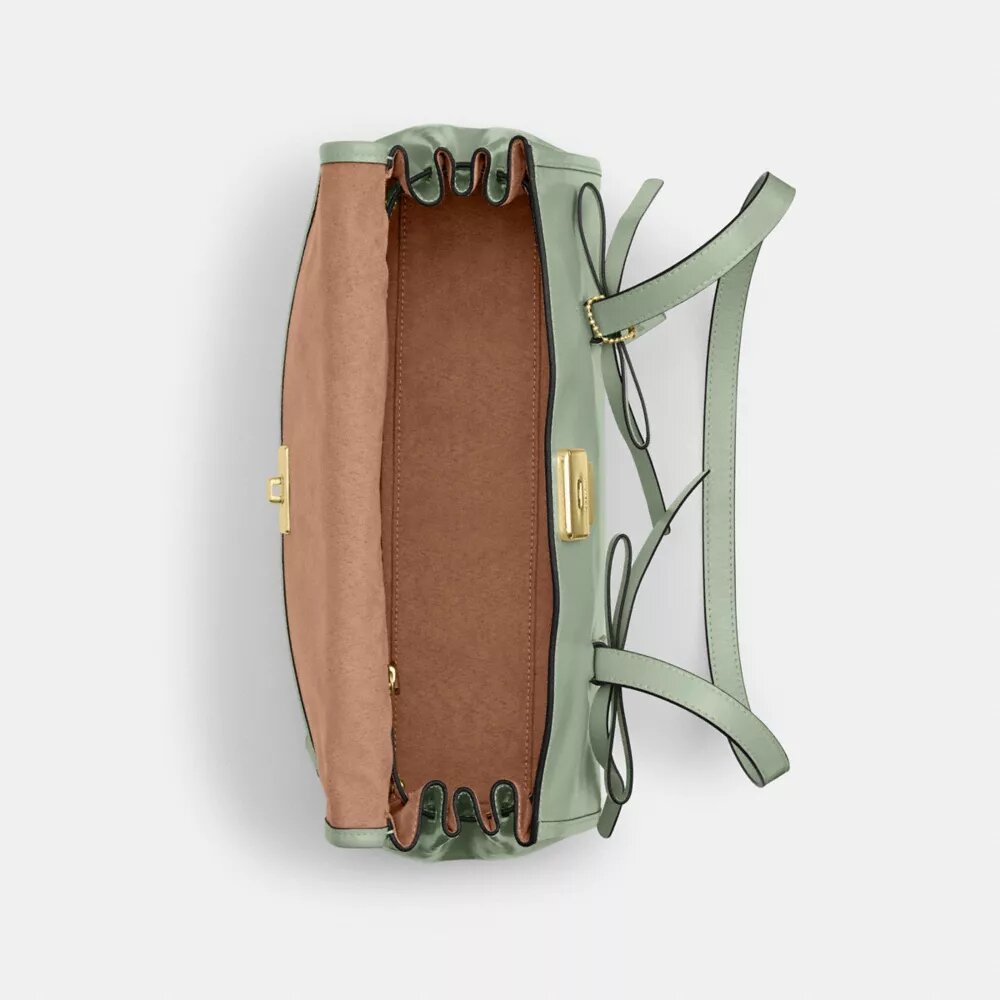 Borsa a tracolla con patta Bridget e fiocchi