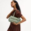 Borsa a tracolla con patta Bridget e fiocchi
