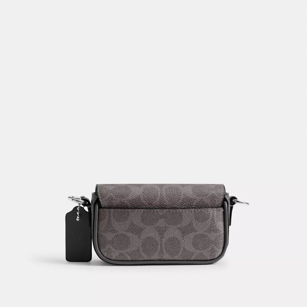 Borsa a tracolla con patta in Signature Canvas
