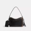 Borsa a tracolla Dakota in pelle "Loved" con ciondoli