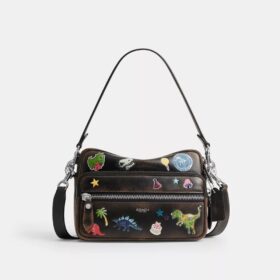 Borsa a tracolla Dakota per il decimo compleanno di Rexy in pelle "Loved" con stampa adesivi