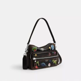 Borsa a tracolla Dakota per il decimo compleanno di Rexy in pelle “Loved” con stampa adesivi