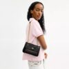 Borsa a tracolla Elodie 18 in Signature Canvas