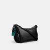 Borsa a tracolla Finn con tasche e ciondoli