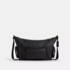 Borsa a tracolla Finn con tasche in Signature Canvas
