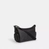 Borsa a tracolla Finn con tasche in Signature Canvas