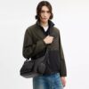 Borsa a tracolla Finn con tasche in Signature Canvas
