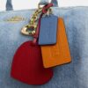 Borsa a tracolla grande Rowan in denim "Loved" con ciondoli