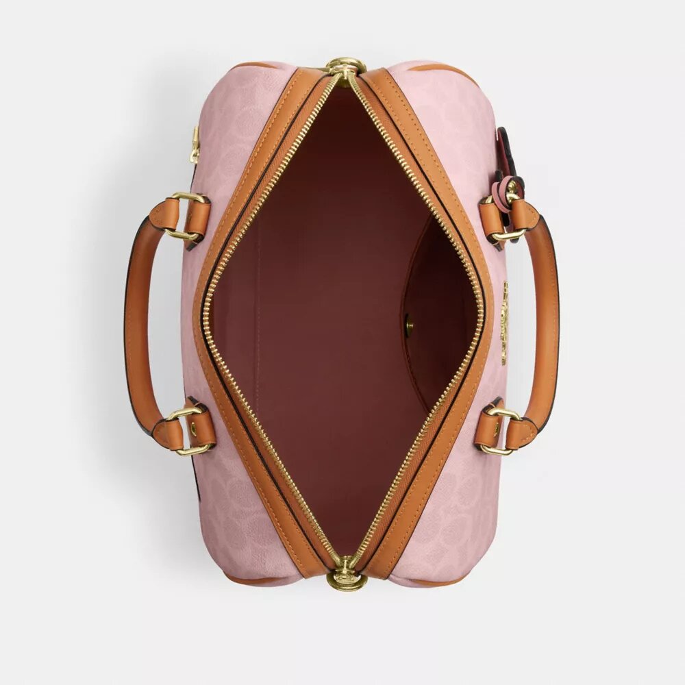 Borsa a tracolla grande Rowan in Signature Canvas con ciondoli
