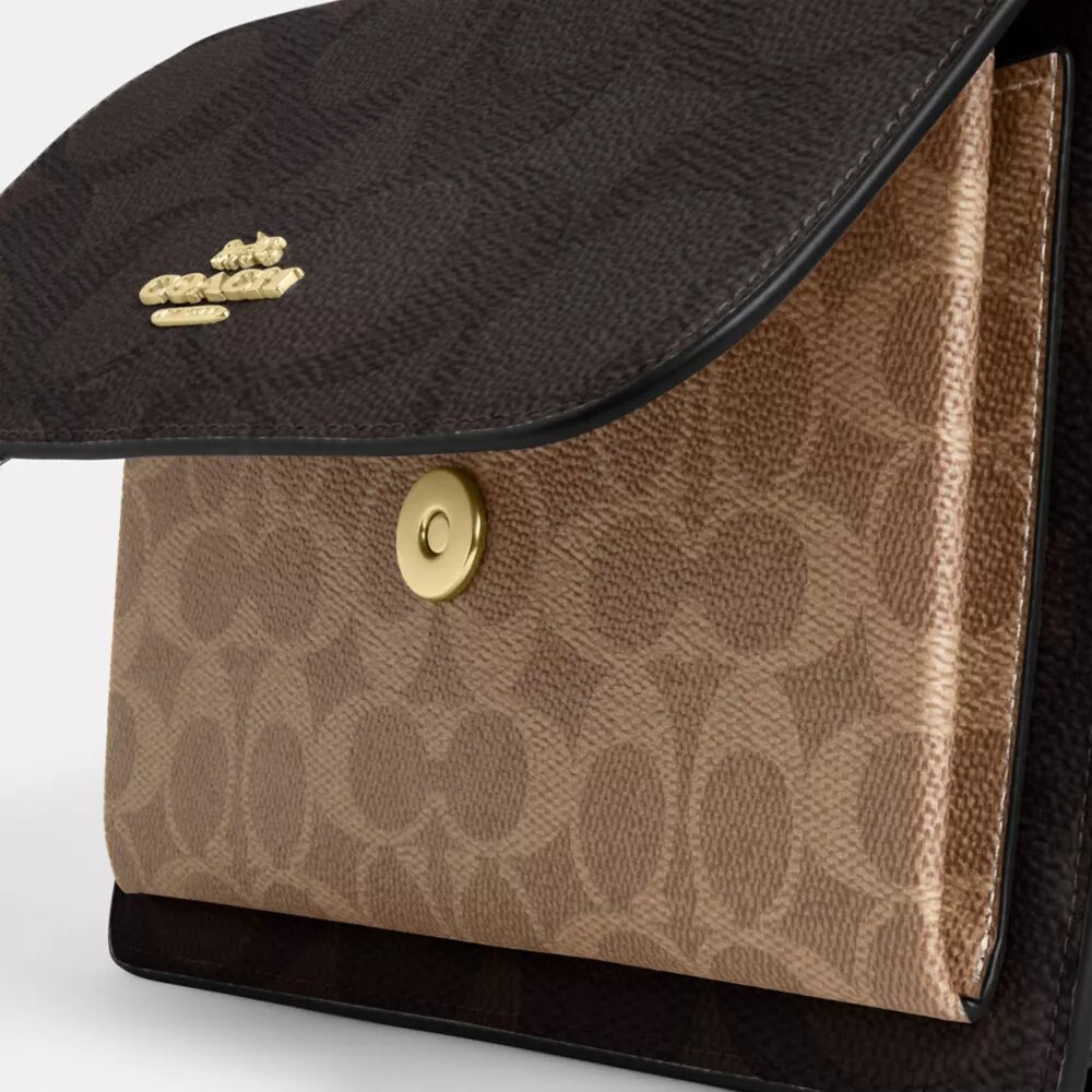 Borsa a tracolla Klare in Signature Canvas a blocchi