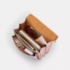 Borsa a tracolla Klare in Signature Canvas con ciondoli