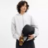 Borsa a tracolla Leo in Nylon esclusivo con ciondoli