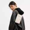 Borsa a tracolla Mila in Signature Canvas