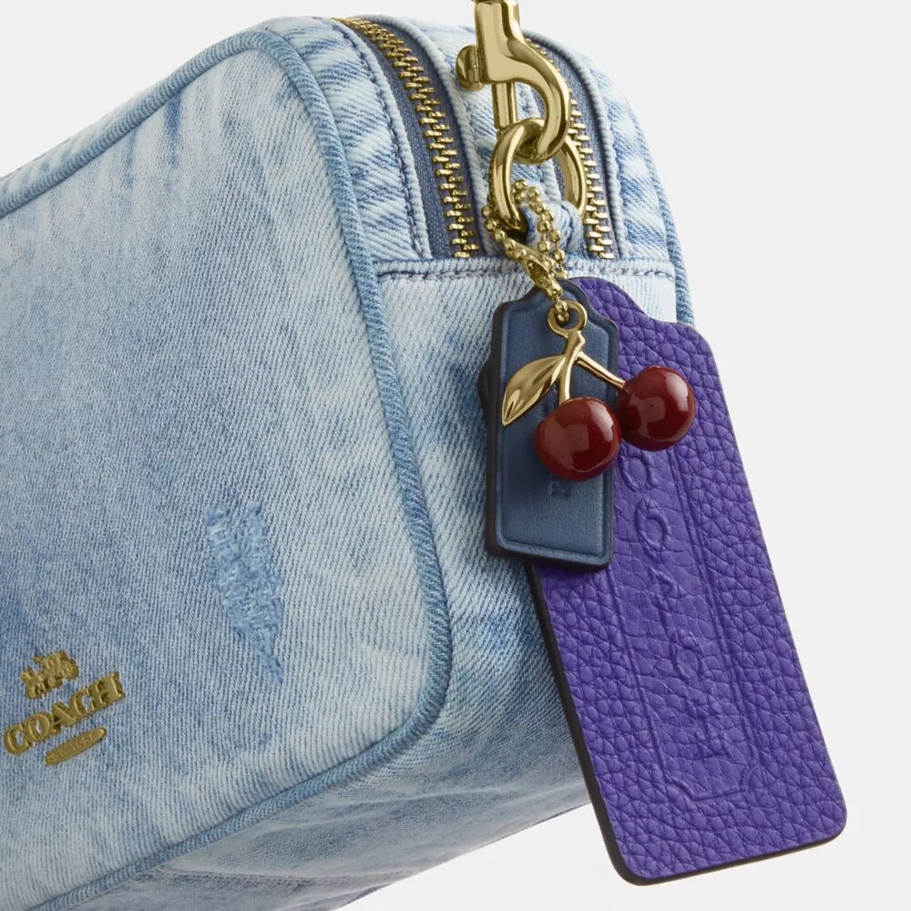 Borsa a tracolla Mini Carey in denim "Loved" con ciondoli