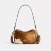 Borsa a tracolla Mini Carey in pelle di vitello con stampa bovina