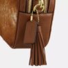 Borsa a tracolla Mini Carey in pelle di vitello con stampa bovina