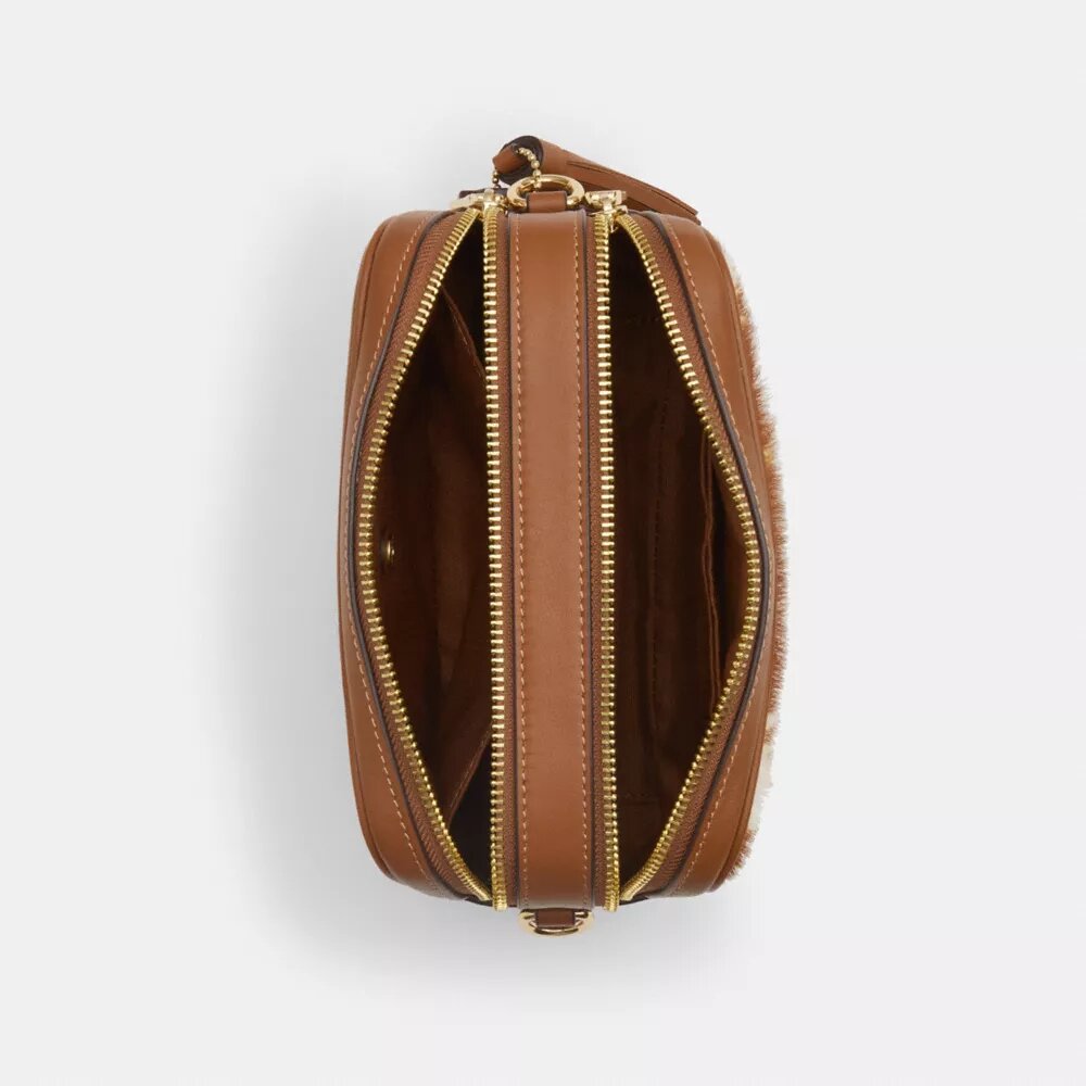 Borsa a tracolla Mini Carey in pelle di vitello con stampa bovina