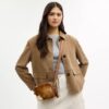 Borsa a tracolla Mini Carey in pelle di vitello con stampa bovina