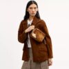 Borsa a tracolla Mini Carey in pelle di vitello con stampa bovina