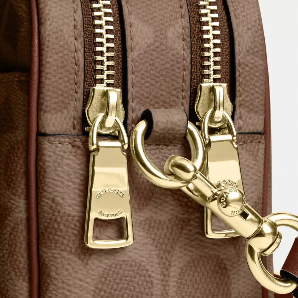 Borsa a tracolla Mini Carey in Signature Canvas