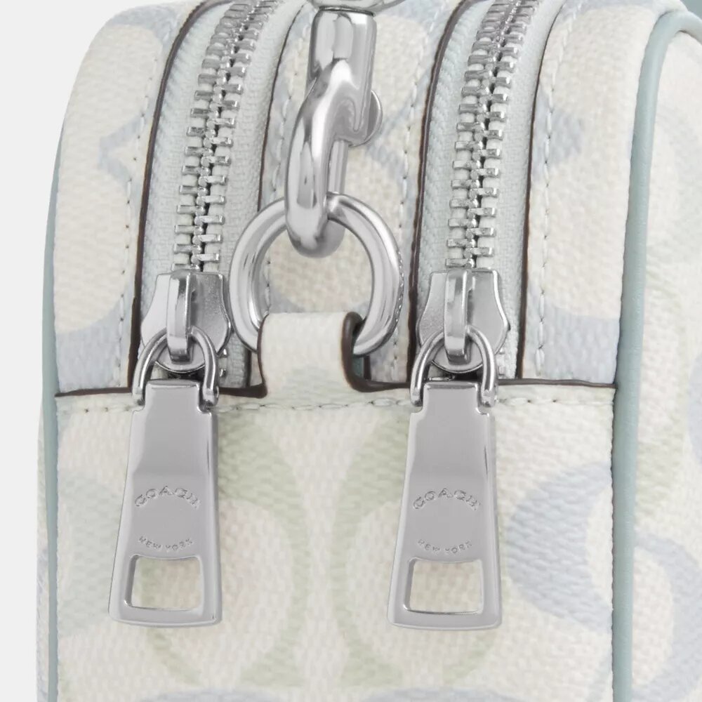 Borsa a tracolla Mini Carey in Signature Canvas