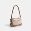 Borsa a tracolla Mini Carey in Signature Canvas