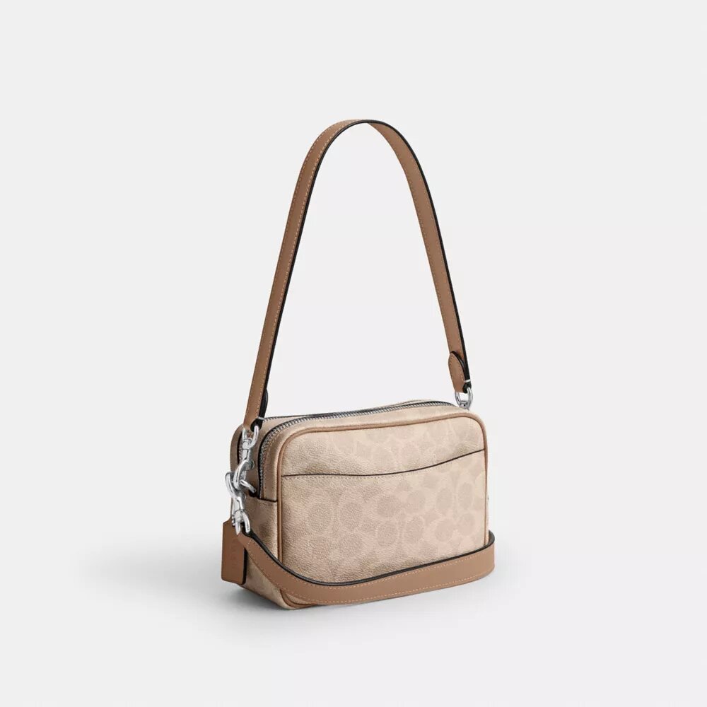 Borsa a tracolla Mini Carey in Signature Canvas