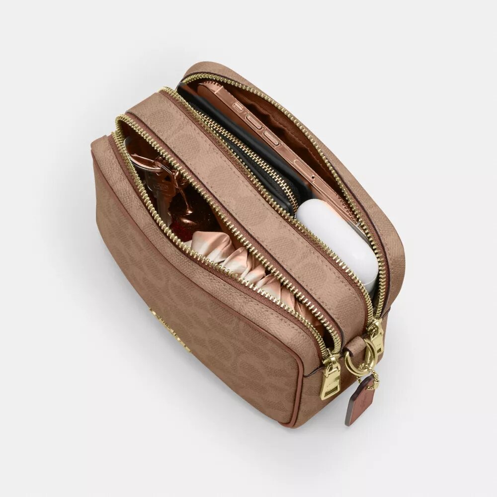 Borsa a tracolla Mini Carey in Signature Canvas