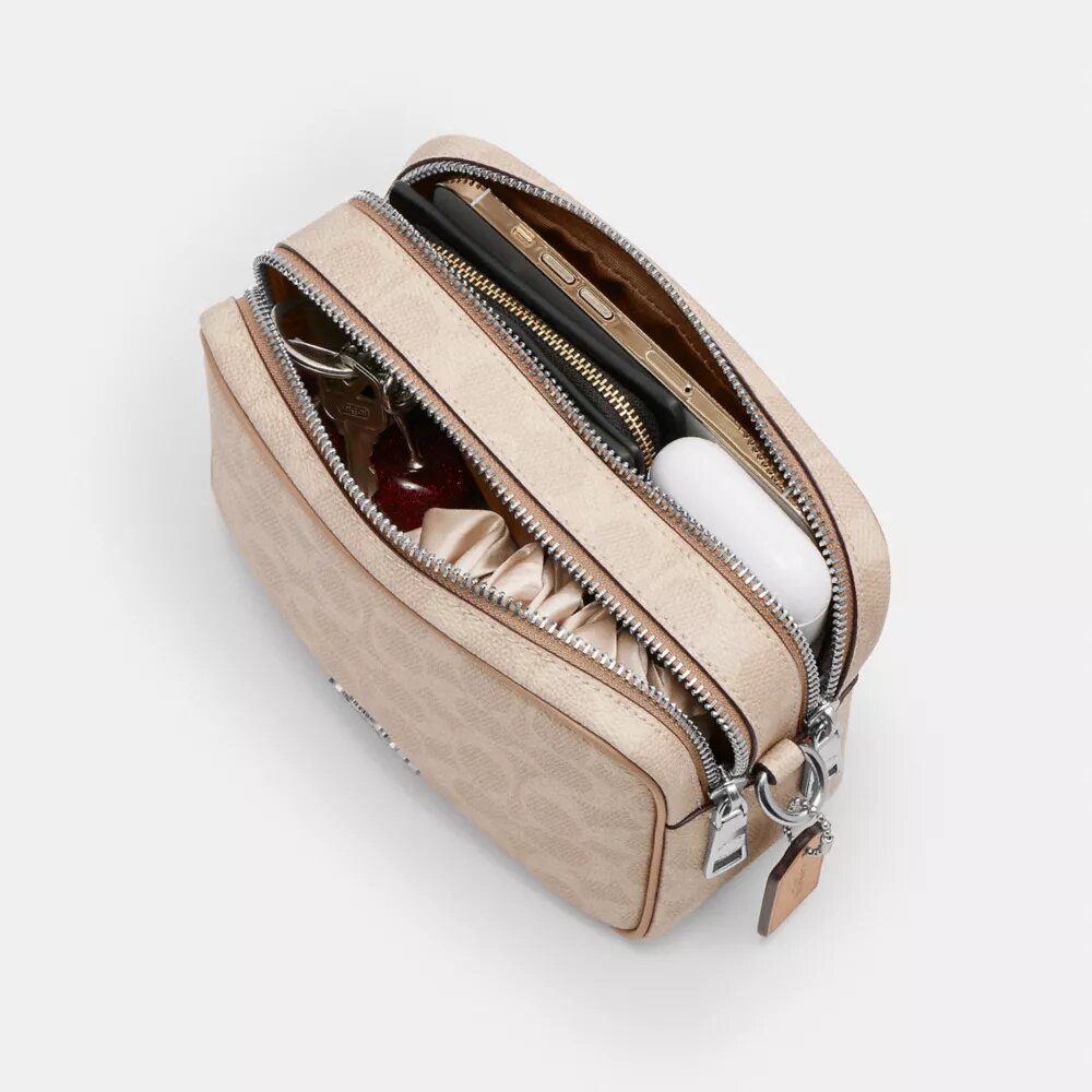 Borsa a tracolla Mini Carey in Signature Canvas