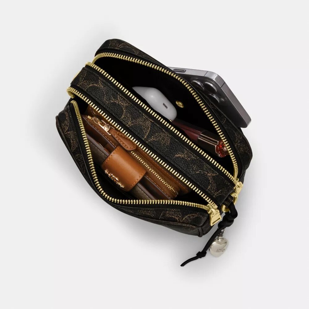 Borsa a tracolla Mini Carey in Signature Canvas