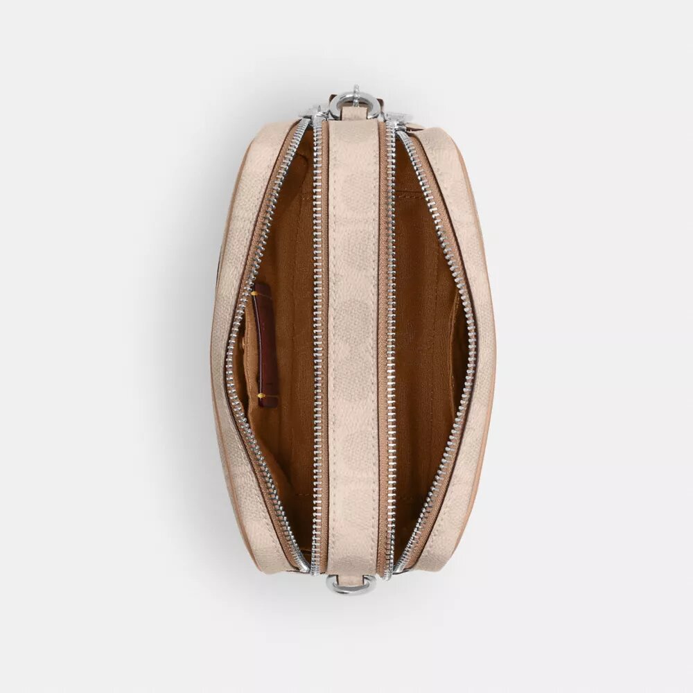 Borsa a tracolla Mini Carey in Signature Canvas