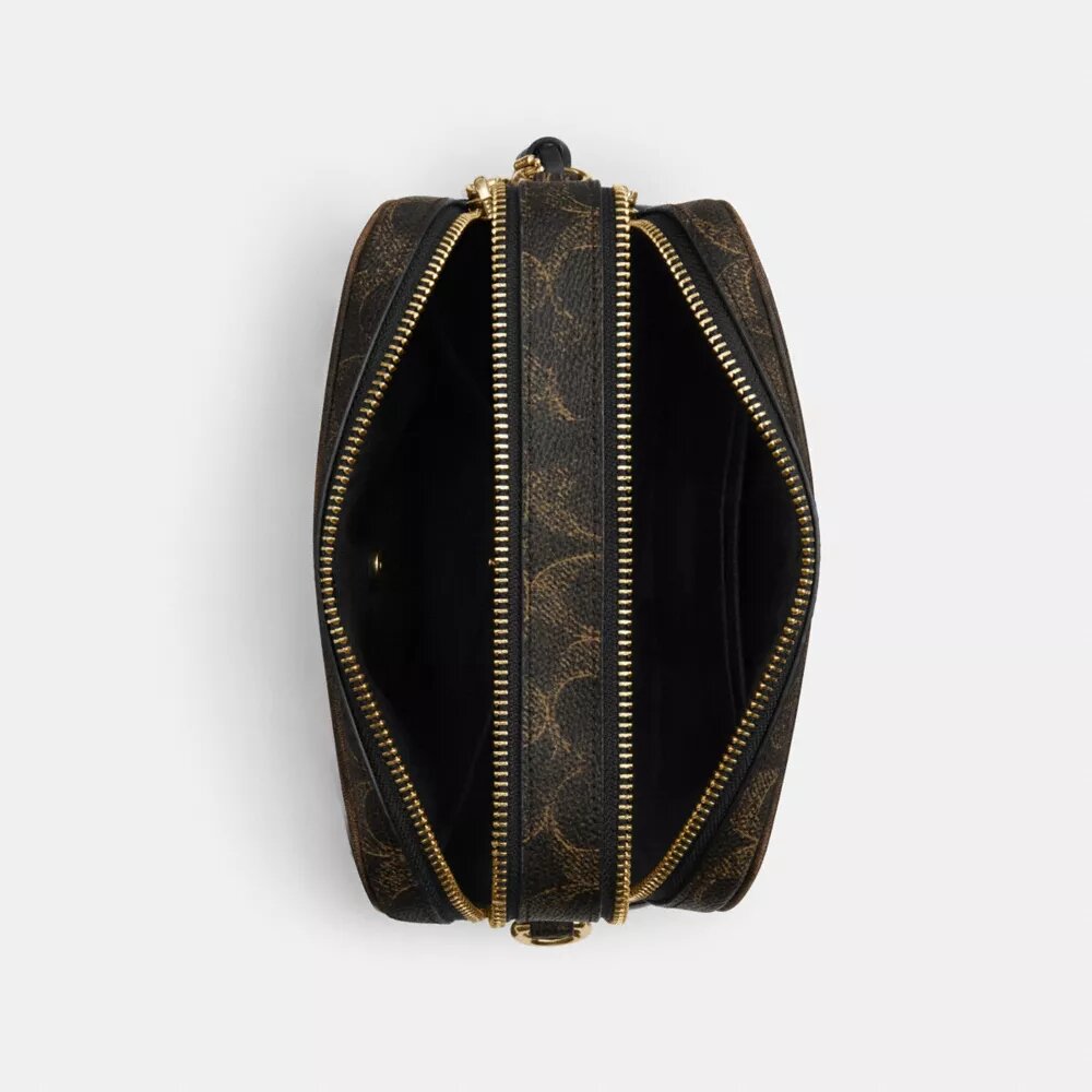 Borsa a tracolla Mini Carey in Signature Canvas