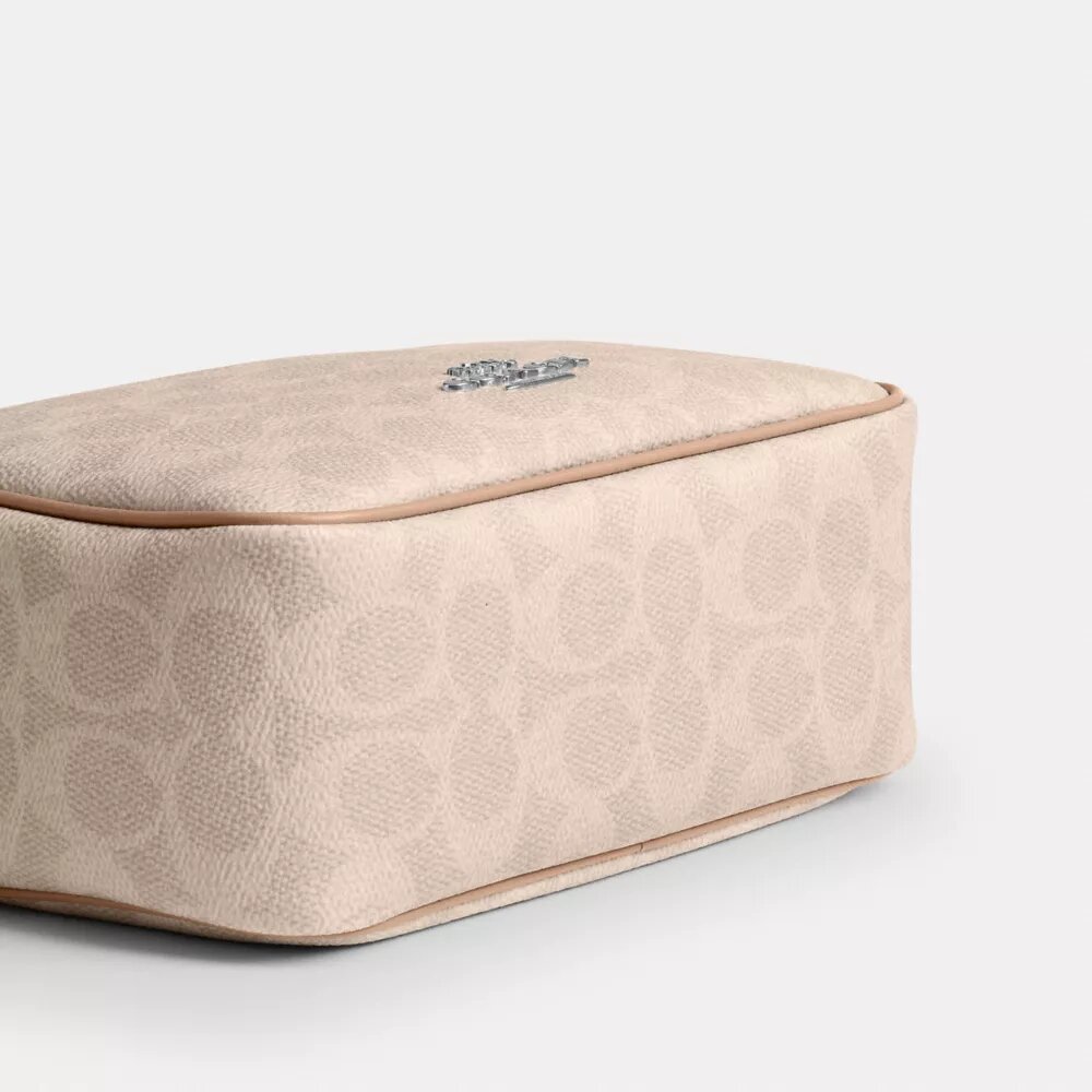 Borsa a tracolla Mini Carey in Signature Canvas
