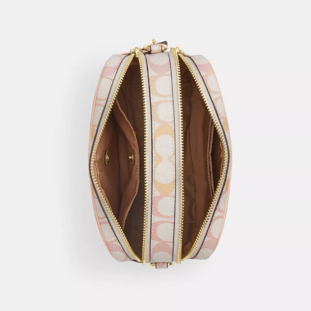 Borsa a tracolla Mini Carey in Signature Canvas