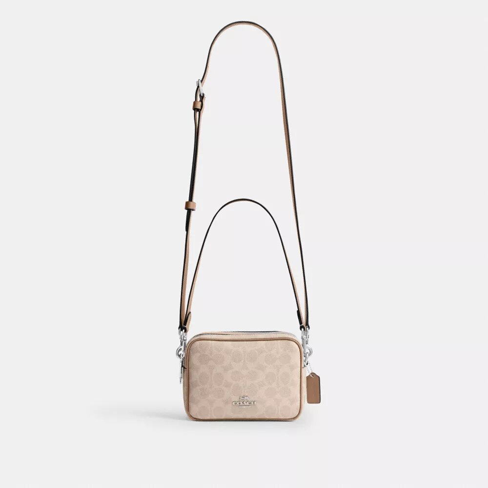 Borsa a tracolla Mini Carey in Signature Canvas