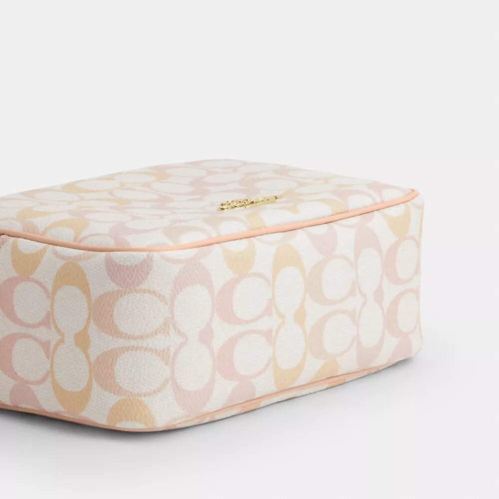 Borsa a tracolla Mini Carey in Signature Canvas