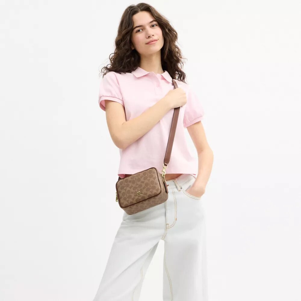 Borsa a tracolla Mini Carey in Signature Canvas